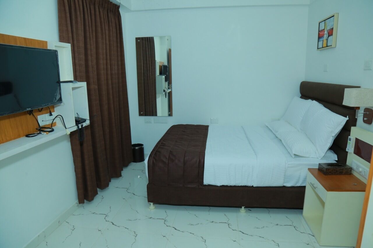 Apartment, 3 Bedrooms | Minibar, soundproofing, iron/ironing board, free WiFi