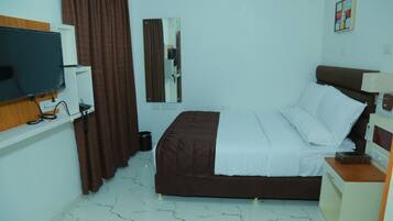 Apartment, 3 Bedrooms | Minibar, soundproofing, iron/ironing board, free WiFi