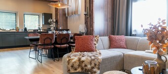 Modern group lodge for families and friends, offering plenty of space, privacy, and a unique location among the mountains of Leutasch, perfect for both winter and summer.