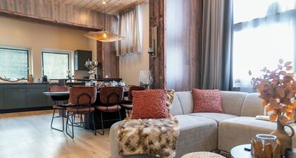 Moderne Gruppenlodge für Familien und Freunde, mit viel Platz, Privatsphäre und einer einzigartigen Lage inmitten der Berge von Leutasch, perfekt für Winter und Sommer.