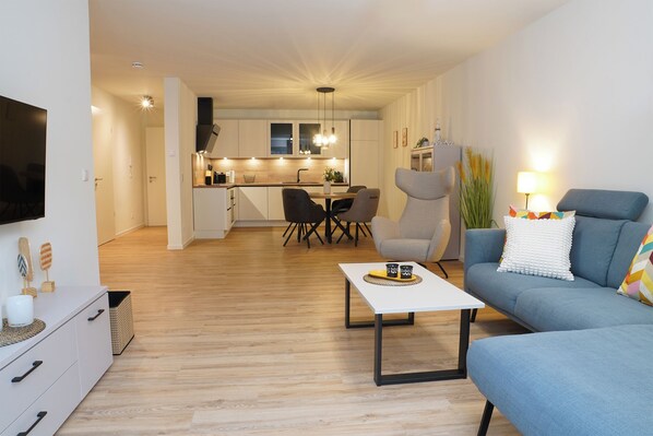 TV - Küste33/8 - North Sea time on the dyke. Sauna. Beach chair. Balcony. (Tossens)