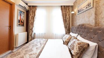 Superior Suite, 1 Bedroom | In-room safe, iron/ironing board, free WiFi