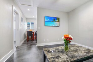 Interior - A boutique, renovated coastal retreat featuring fully equipped condos w/kitchen, minutes walking to the beach & restaurants, exciting amenities like a heated pool, BBQ Grill, hammock and fun yard games. Centrally located, minutes to Pompano Beach! (Pompano Beach)