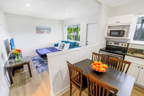 Interior - A boutique, renovated coastal retreat featuring fully equipped condos w/kitchen, minutes walking to the beach & restaurants, exciting amenities like a heated pool, BBQ Grill, hammock and fun yard games. Centrally located, minutes to Pompano Beach! (Pompano Beach)