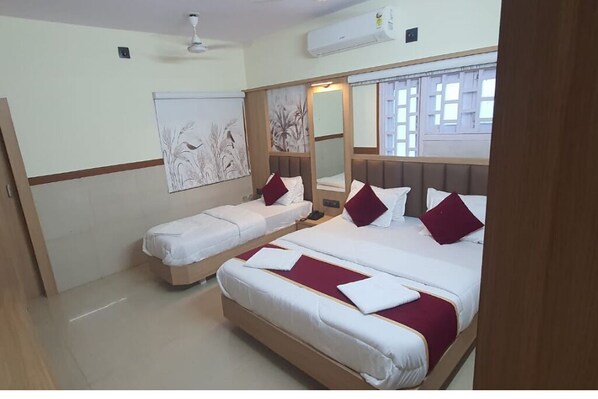 Deluxe Triple Room, City View | Desk, laptop workspace, free WiFi - Hotel Shreenidhi Dwarka (Dwarka)