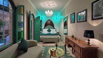 Deluxe Suite, Patio, Pool View | Premium bedding, in-room safe, iron/ironing board, free WiFi
