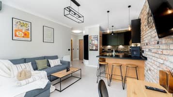 Comfort Apartment, Garden View | Living area