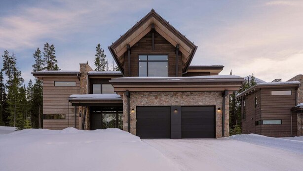 A modern multi-story house with a prominent gabled roof, large windows, and a garage. - 8 Speedwell 4 Bedroom Home (Big Sky)