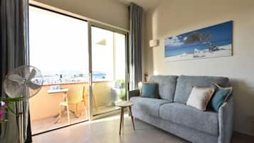 Apartamento, 1 quarto, sacada | Sala de estar