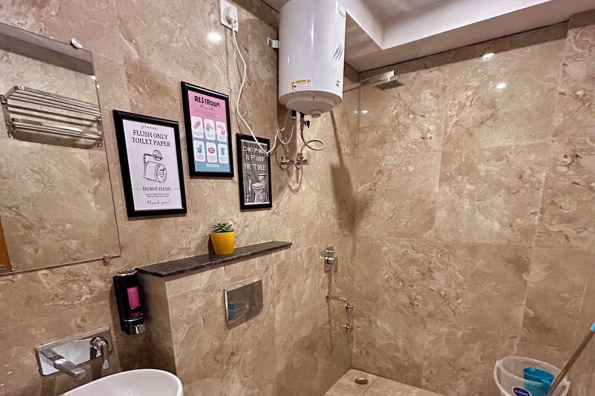 Deluxe Shared Dormitory | Bathroom | Shower, soap, toilet paper