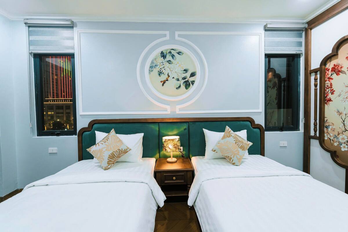 Chambre Classique avec lits jumeaux, balcon, vue parc