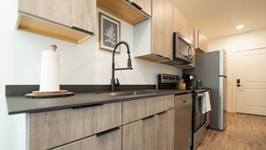 Coffee/tea maker, fridge, microwave, oven
