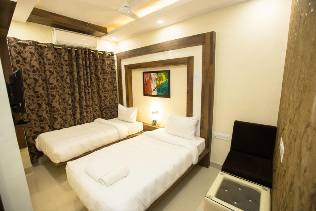 Habitació doble superior, vistes a la ciutat | Escriptori, planxa i posts de planxar i wifi gratuïta 