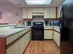 Fridge, microwave, oven, stovetop - Lone Oak Point 16 - Three Bedroom Apartment, Sleeps 8 (Sunrise Beach)