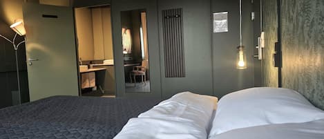 Double Room, 1 King Bed, City View, Private bathroom/shared shower | Desk, laptop workspace, blackout curtains, bed sheets