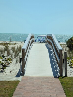 On the beach - Enjoy two views, gulf and golf, in this beautiful 2 bedroom at Sunset South. (Sanibel)