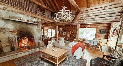 Beautiful Wintry Log Cabin Immersed in Nature