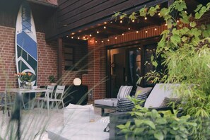 Outdoor dining - Goodwood Lodge am See - Holiday home with sauna (Scharbeutz)