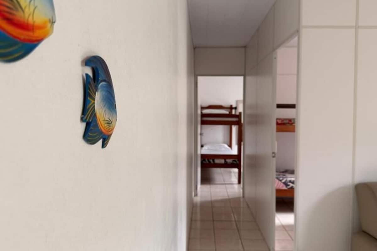 Apartamento família, vista para o pátio | Escrivaninha, cortinas blackout, Wi-Fi de cortesia