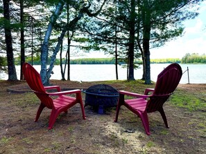 Property grounds - Charming Lakefront Cabin. 100 ft private beach with dock on Lake of the Falls. (Mercer)
