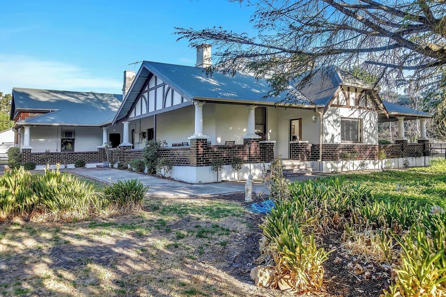 The stately 1925 façade of Yucanta Park reflects its grand Adelaide Hills heritage, combining all the peace, privacy and lifestyle options of a rural estate.