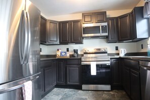 Unclassified image, 3 of 25, button - Beautiful 2-story Downtown Worcester king bed with Office (Worcester)