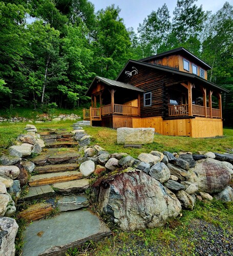 Gorgeous log cabin overlooking the Dead River just north of Berry's Store Rt 201