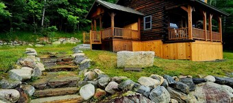 Gorgeous log cabin overlooking the Dead River just north of Berry's Store Rt 201