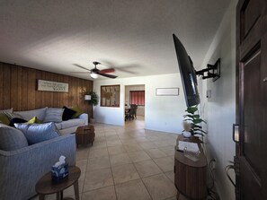 Smart TV, books - Laylas lounge welcomes familes and furr babie as well. (Carlsbad)