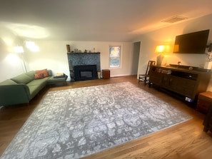 Smart TV, fireplace, table tennis, books