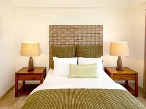 2 chambres, coffres-forts dans les chambres, fer et planche à repasser