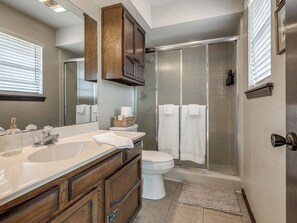 Shower, hair dryer, towels, soap