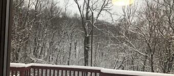 Private home with great location and amenities!  Wraparound deck in the woods!