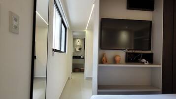 Desk, laptop workspace, blackout curtains, iron/ironing board