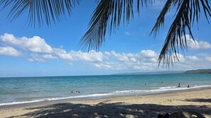 A beach with clear skies and calm waters. - Sea Breeze Escape. Perfect spot for family fun by the sea!
Pack your flip-flops! (Sosúa)