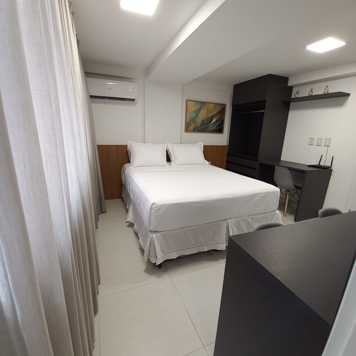 Estúdio básico | Cortinas blackout, ferros/tábuas de passar roupa, Wi-Fi de cortesia