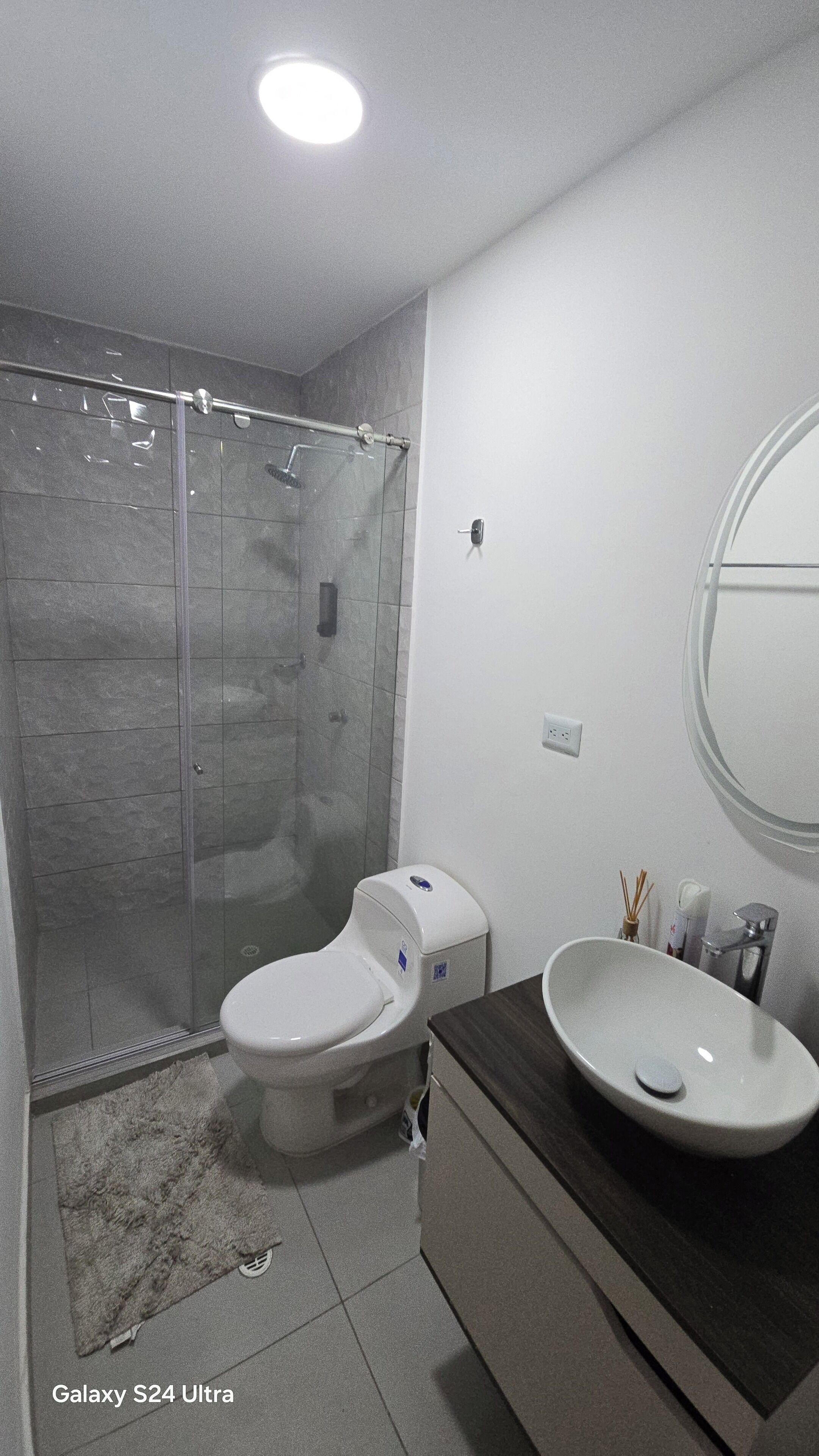 Shower, towels, soap, toilet paper