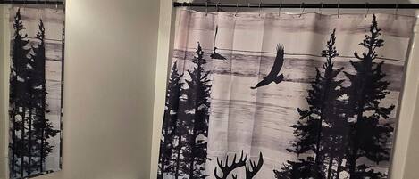 Shower, towels, soap, toilet paper
