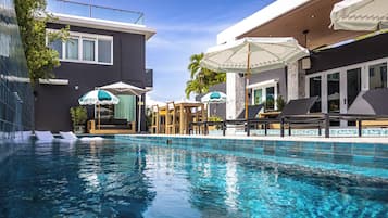 Outdoor pool, pool umbrellas, pool loungers