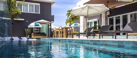 Outdoor pool, pool umbrellas, pool loungers