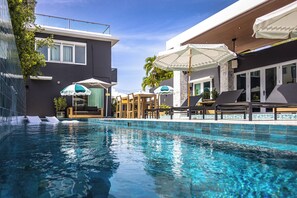 Outdoor pool, open 8:00 AM to 10:00 PM, pool umbrellas, pool loungers - Portofino 4BD Suite Pool Resort Vibe (San Juan)