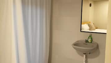 Comfort Room, Courtyard View | Bathroom | Towels, soap, shampoo, toilet paper