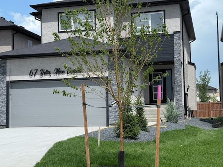 Exterior. Warm, Inviting Basement Suite • Quiet Stay in a Safe, Upscale Area