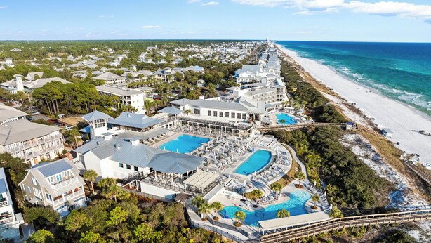 A resort with multiple swimming pools, beachfront access, and a variety of building structures. - Camp District Luxury | Private Courtyard Pool | Electric Cart | Beach Club Access (Santa Rosa Beach)