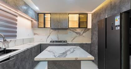 Stylish 3 BR condo with 24/7 Power, high speed WiFi, Pool, & a PS5