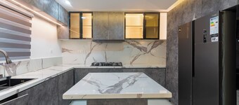 Stylish 3 BR condo with 24/7 Power, high speed WiFi, Pool, & a PS5