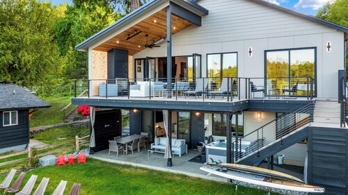 Luxe Port Lookout with waterfront with dock, theater, hot tub, and huge deck