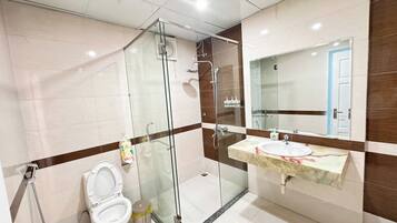 Shower, hair dryer, soap, shampoo