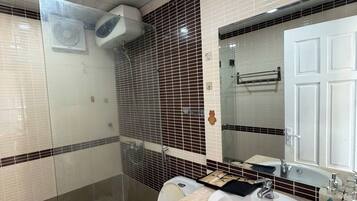 Shower, hair dryer, soap, shampoo