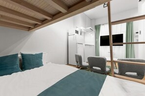 Appartement classique, 1 chambre, non-fumeur (203) | Rideaux d’obscurcissement, fer et planche à repasser